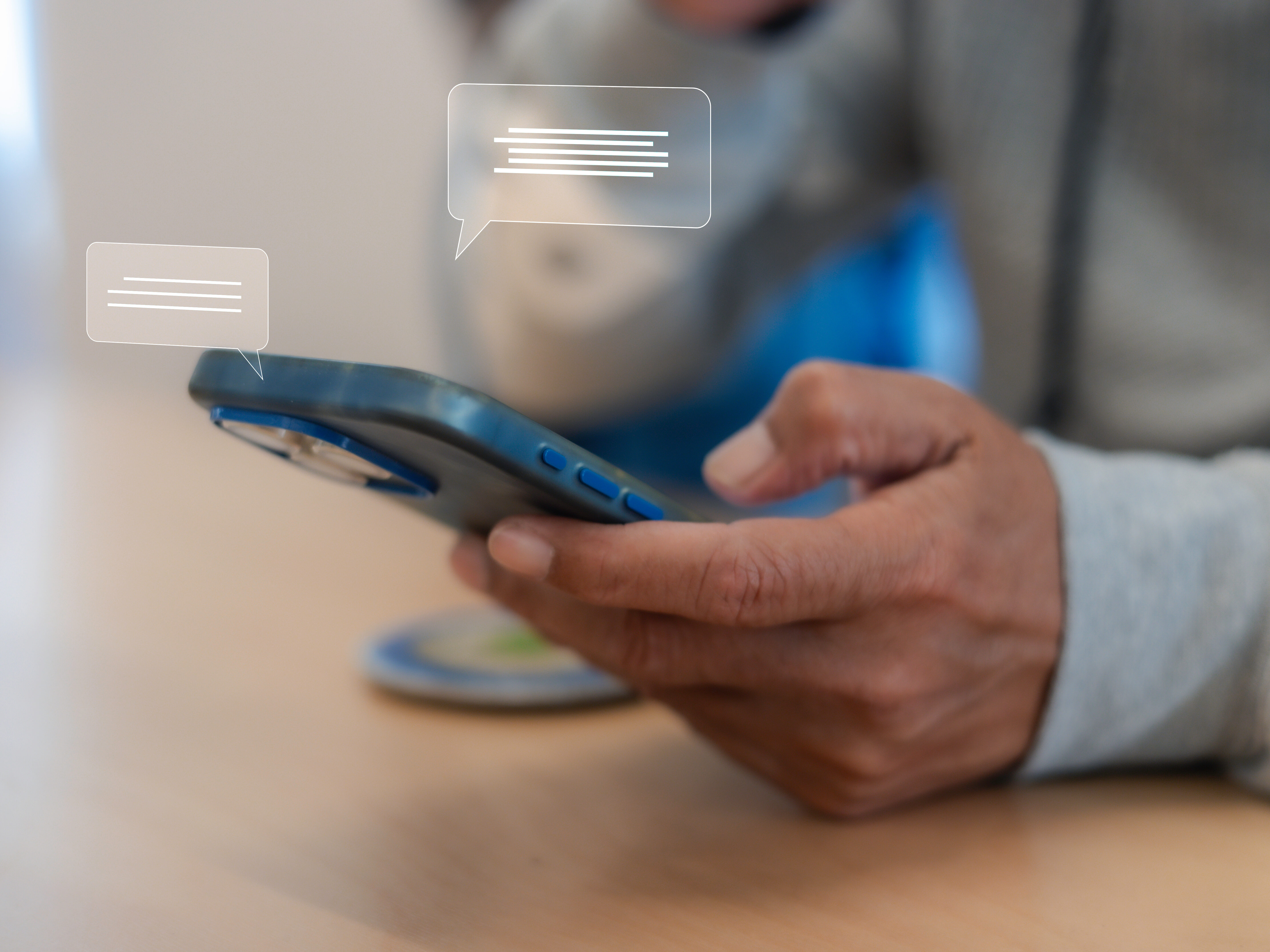 Close up man using smart phone, Social media marketing concept. hand using smartphone typing, chatting conversation in chat box icons pop up